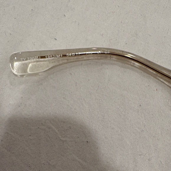 Tory Burch Clear Frame Sunglasses with Light Blue Lenses and Gold Chain Temples - Picture 6 of 7